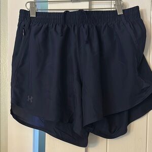 Under Armour women’s running shorts. Size M. NWOT. Navy blue.
